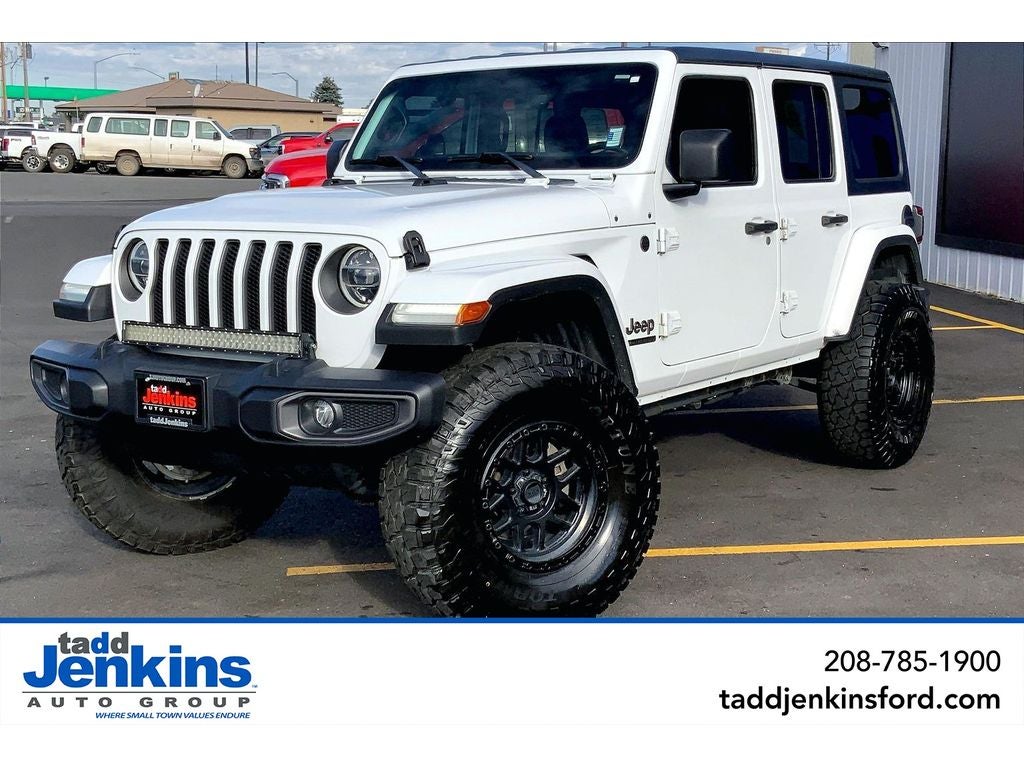 2021 Jeep Wrangler Unlimited 80th Anniversary in Bright White Clearcoat — front three-quarter view