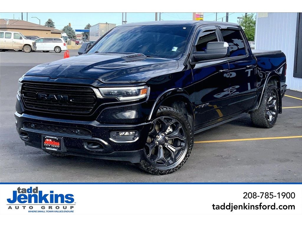 2023 RAM 1500 Limited in Diamond Black Crystal Pearlcoat — front three-quarter view