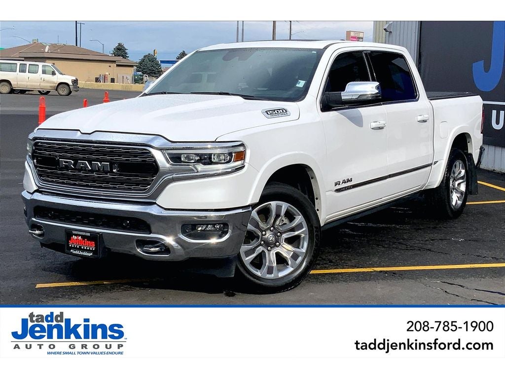 2023 RAM 1500 Limited in Ivory White Tri-Coat Pearlcoat — front three-quarter view