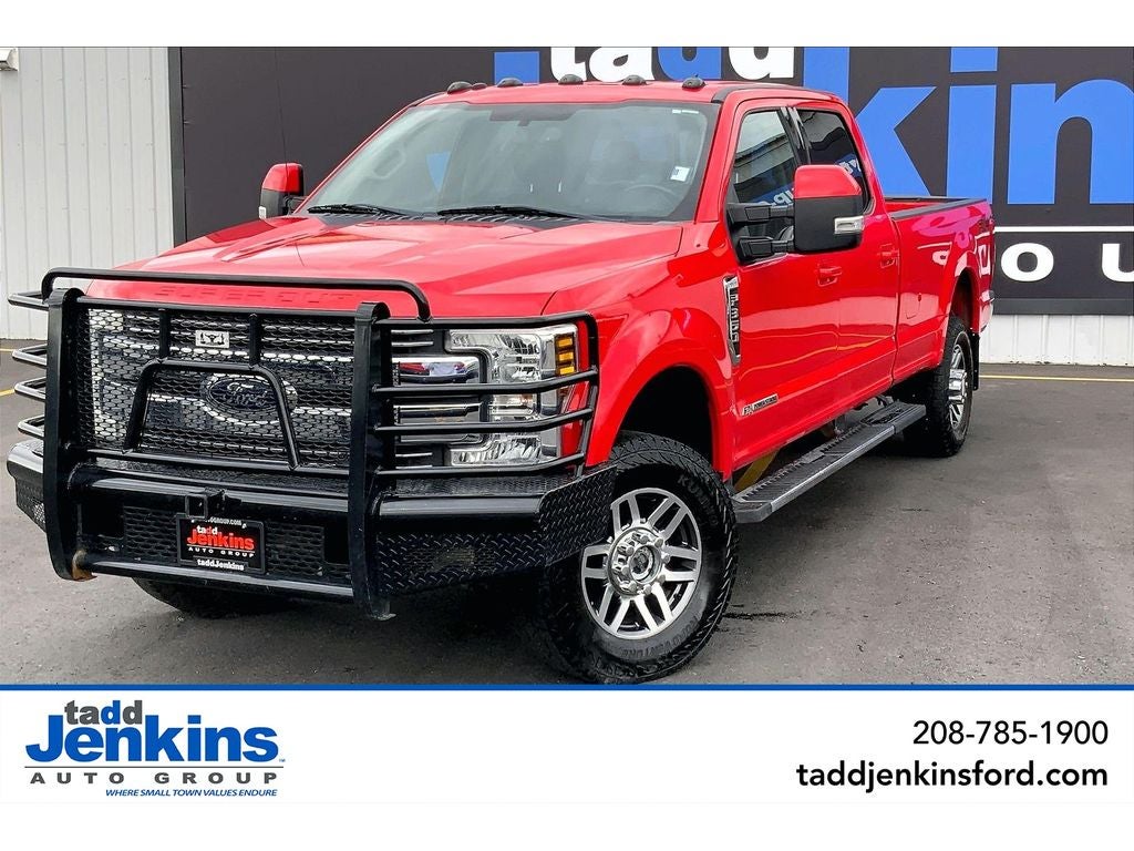 2018 Ford F-350 Super Duty LARIAT in Race Red — front three-quarter view