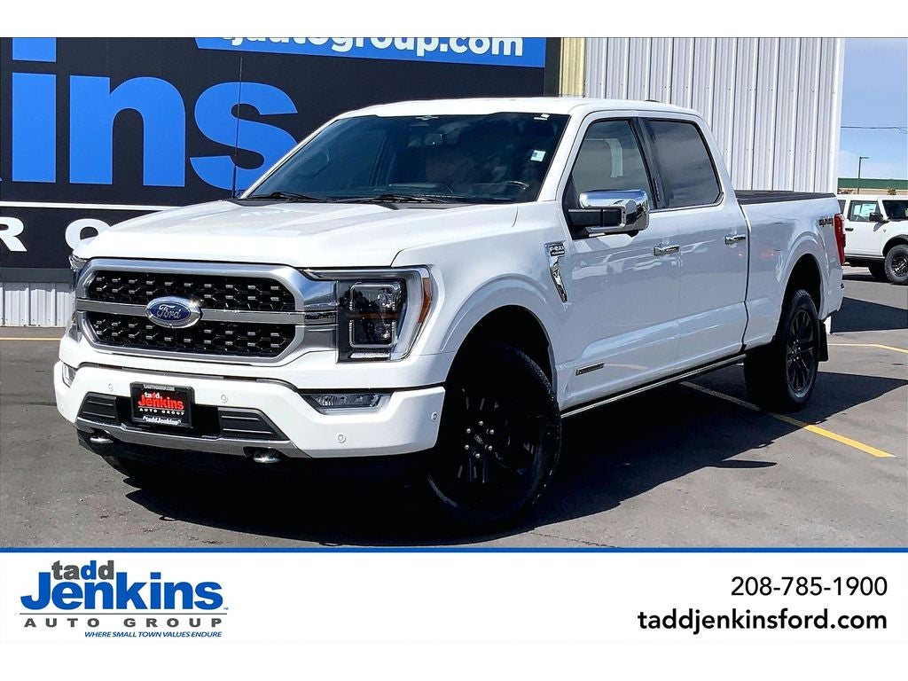 2023 Ford F-150 Platinum in Star White Metallic Tricoat — front three-quarter view