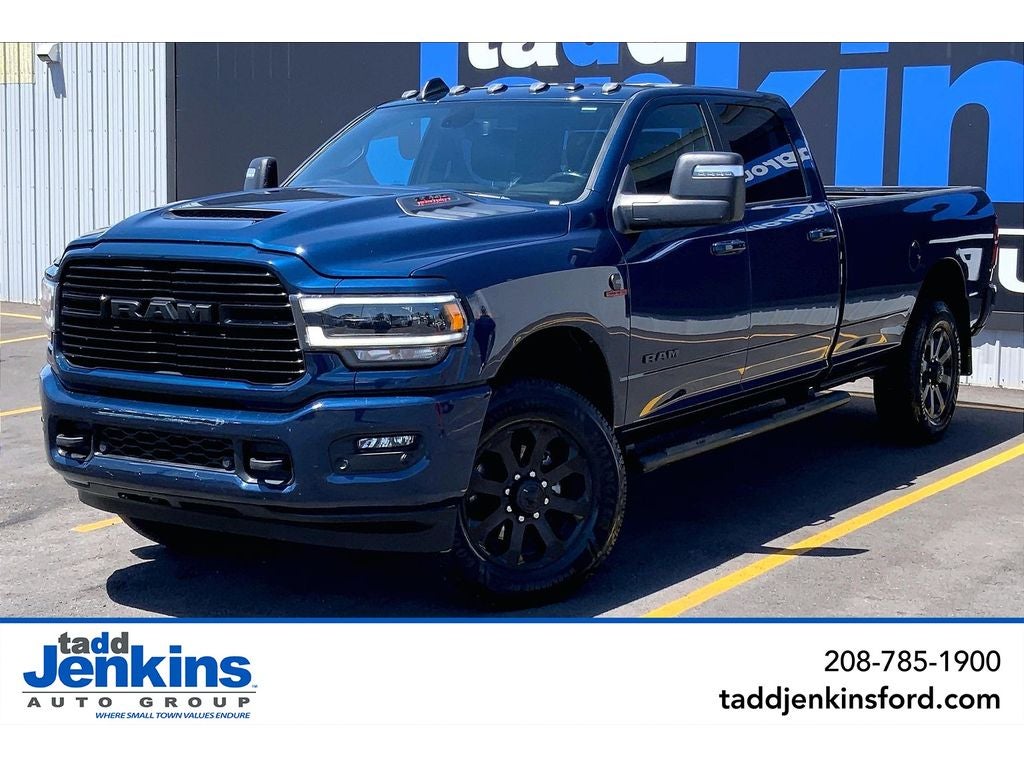 2023 RAM 3500 Laramie in Patriot Blue Pearlcoat — front three-quarter view