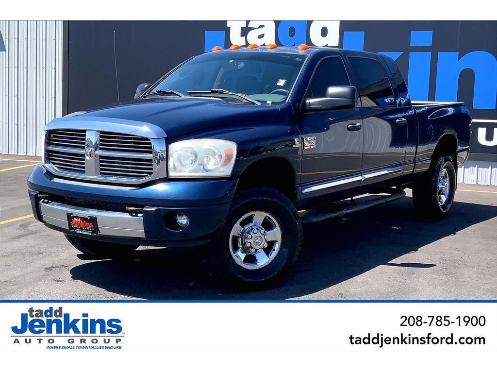 2009 Dodge Ram Pickup 2500 Laramie in Patriot Blue Pearlcoat — front three-quarter view