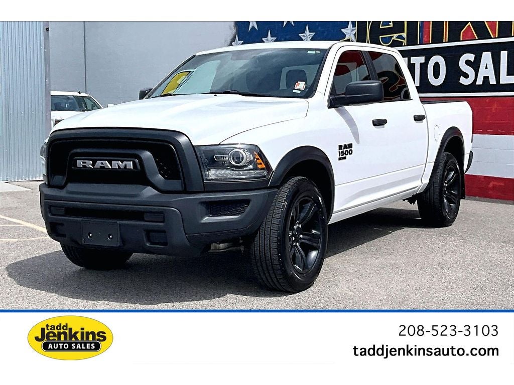 2024 RAM 1500 Classic Warlock in Bright White Clearcoat — front three-quarter view