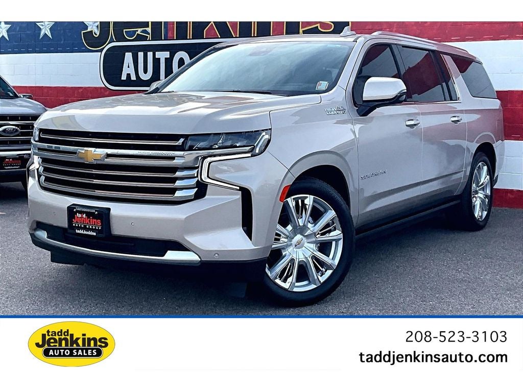 2024 Chevrolet Suburban High Country in Empire Beige Metallic — front three-quarter view
