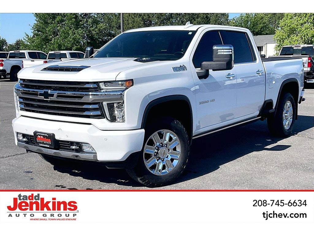 2023 Chevrolet Silverado 3500 HD High Country in Summit White — front three-quarter view